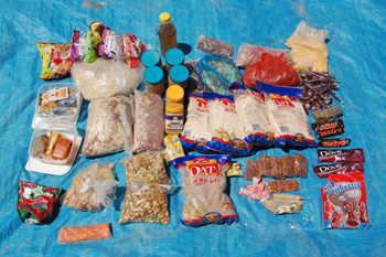 cycling-silk--supplies bagged food supply on a tarp