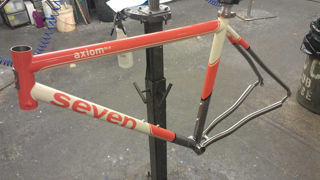 Axiom SLX painted with Gran Fondo scheme in deep coral and bone