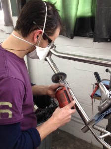 Finsisher wheeling a titanium frame