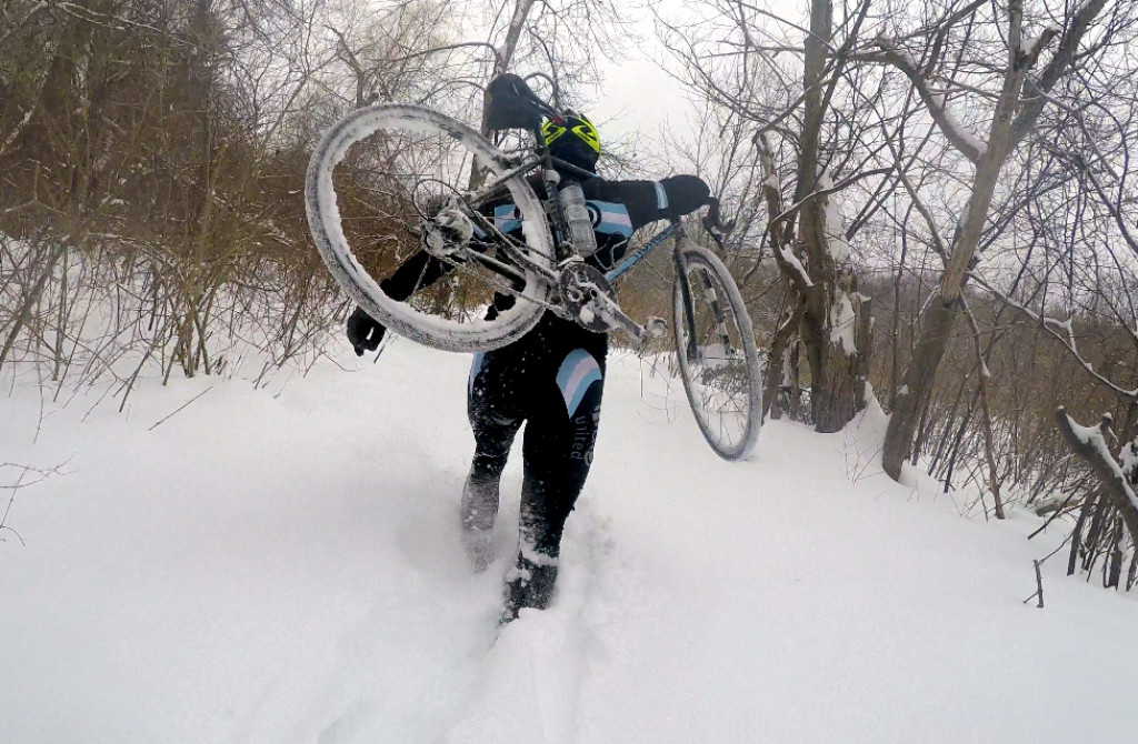 shouldering while climbing through the snow