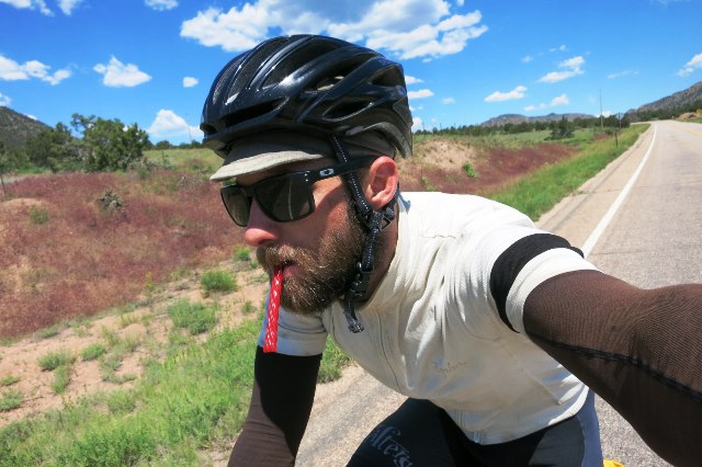Brad eats a twizzler on the ride