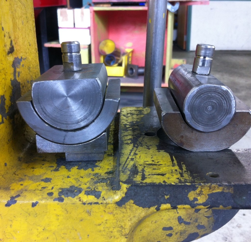 Head badge press