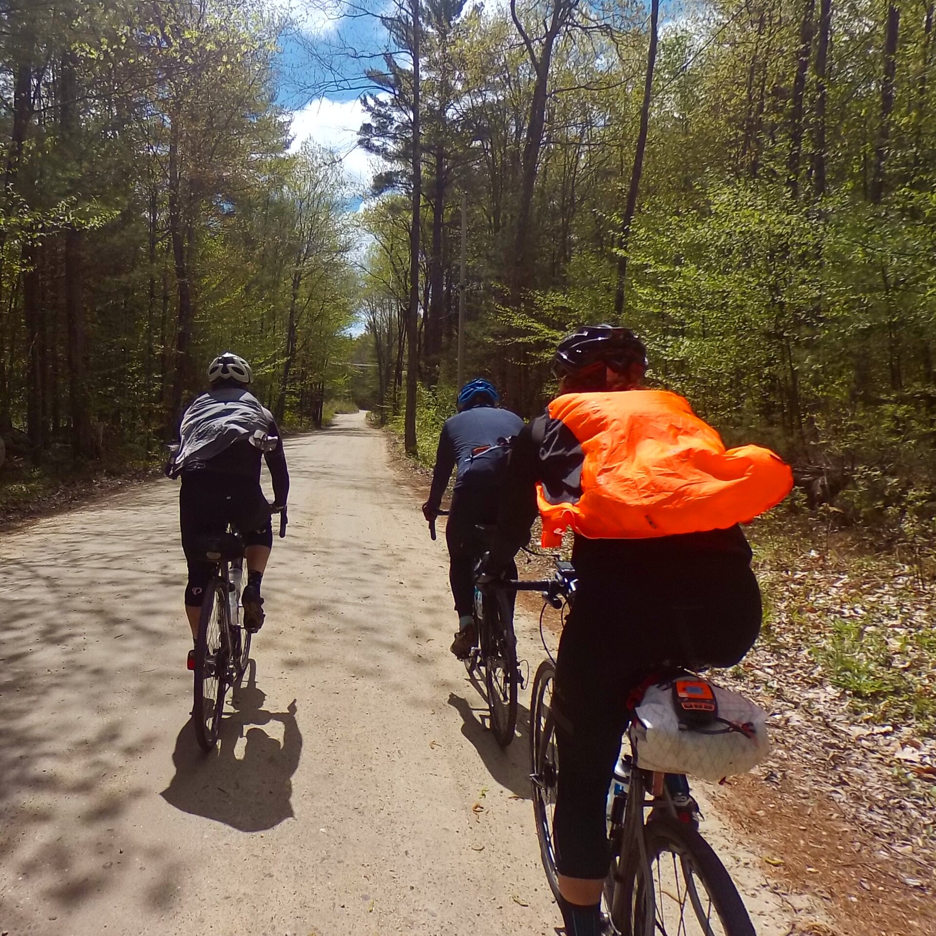 Flying down a sunny dirt road