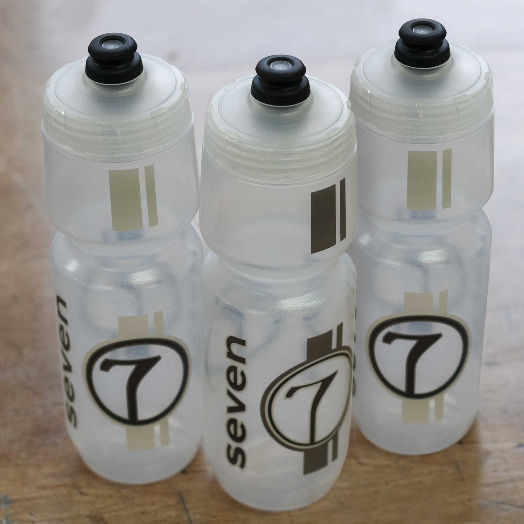 set of three Seven water bottles in cream and copper
