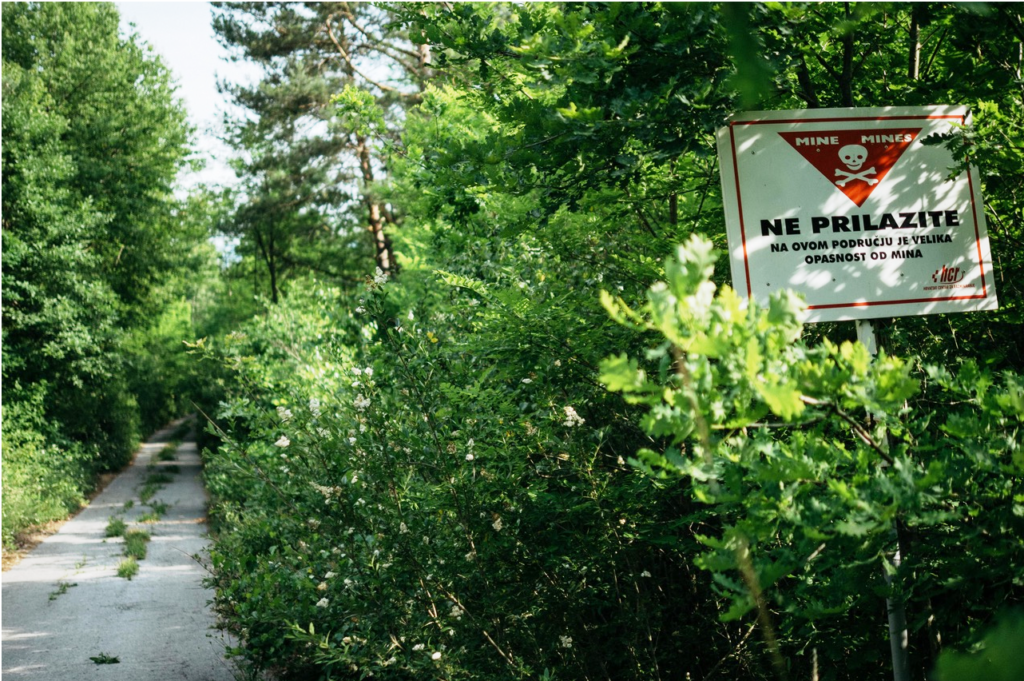 A raoad with a sign that reads
