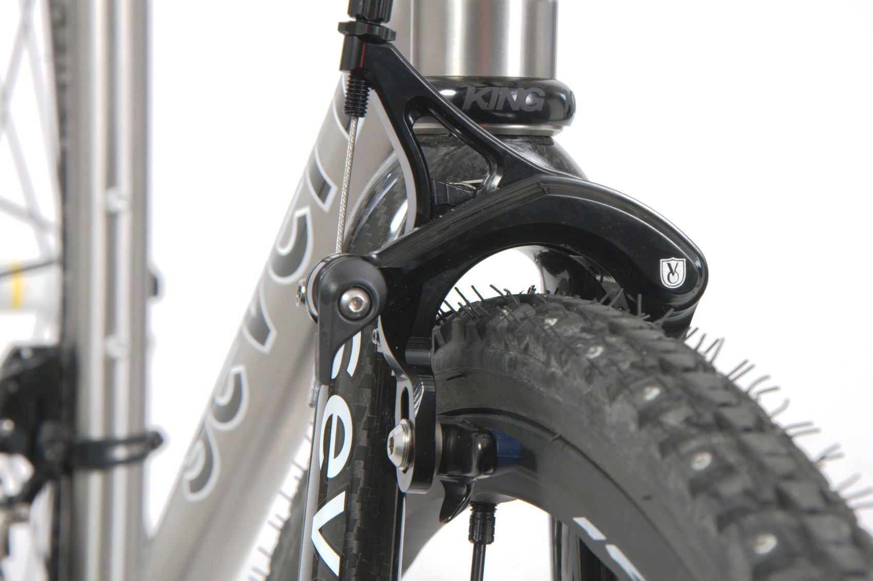 Studded tires and caliper brakes