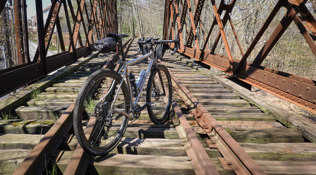 Seven Evergreen on railroad trestle