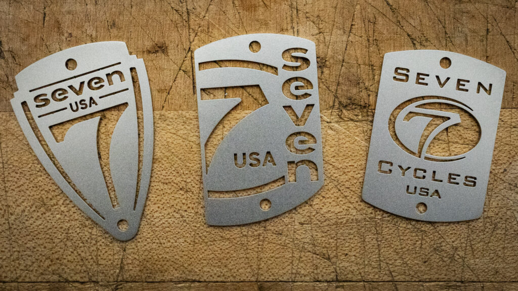Three head tube badges