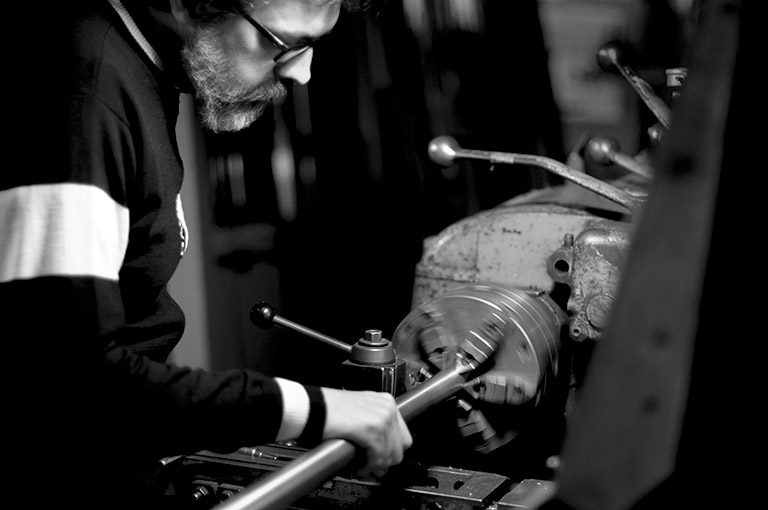 cutting a titanium tube on a lathe